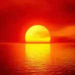Étiquette du fondant parfumé 'Coucher de soleil' à la cire de soja. L'illustration est une photo d'un coucher de soleil sur la mer, évoquant un parfum chaud, solaire et estival.