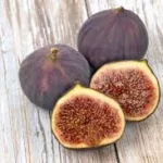 Étiquette du fondant parfumé 'Figues' à la cire de soja. L'illustration est une photo de figues fraîches sur du bois, évoquant un parfum fruité et vert de figuier.