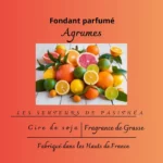 Étiquette du fondant parfumé 'Agrumes' à la cire de soja. L'illustration est une photo d'un assortiment d'agrumes (citron, orange, pamplemousse), évoquant un parfum frais, pétillant et énergisant.